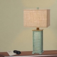 Fangio Lighting's 25.5 in. Resin Table Lamp in an Antique Green Finish